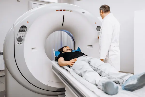 A patient lies in an MRI machine